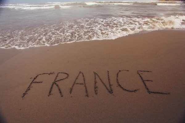 France inscription on sand — Stockfoto