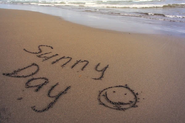 Sunny Day inscription on sand — Stock Photo, Image