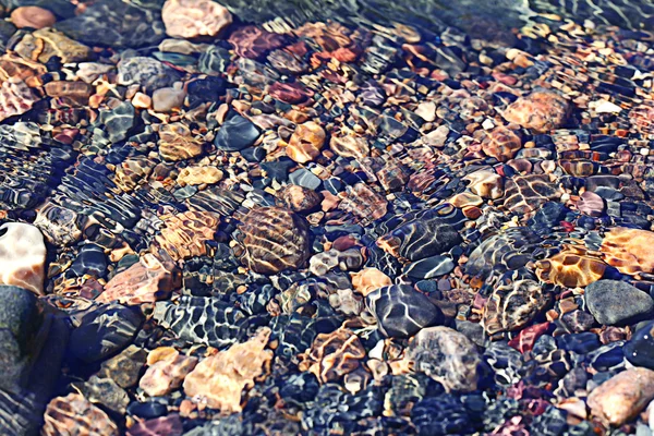 Kiezels onder water — Stockfoto