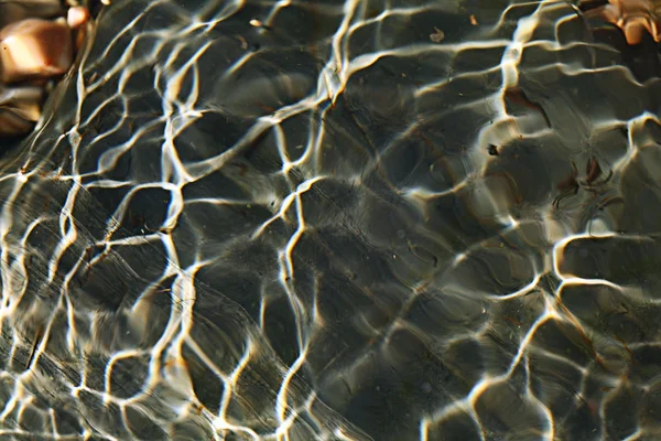 Pebbles under water — Stock Photo, Image