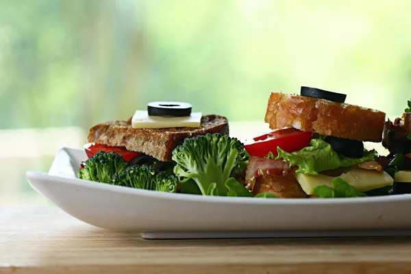 Toasts with bacon and herbs — Stock Photo, Image