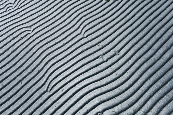 Gray sand beach texture — Stock Photo, Image