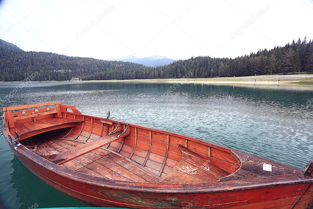 Wooden boat on mooring