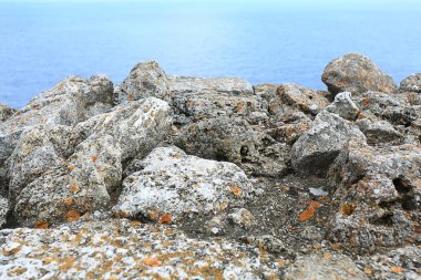 Cliff rocks on coast clipart