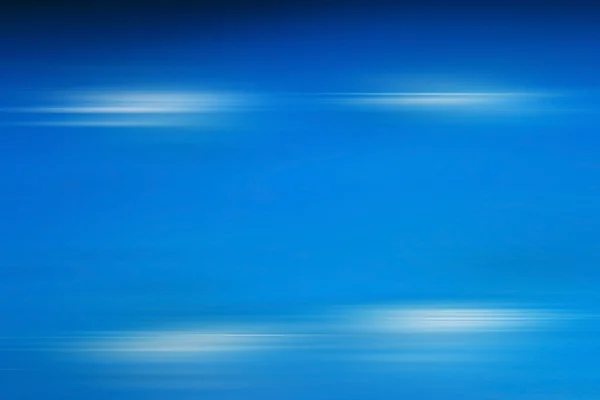 ブルーの背景と動きのブレ — ストック写真
