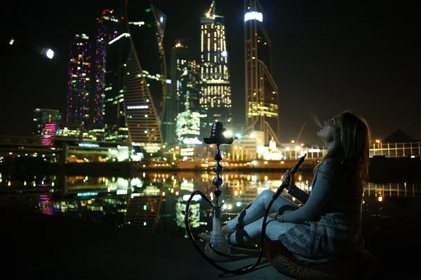 Woman smoking Hookah