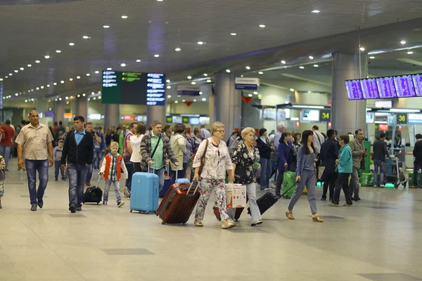 Passengers at airport — Stock Photo, Image