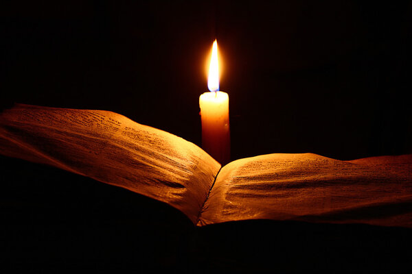 Concept of knowledge, vintage book candle