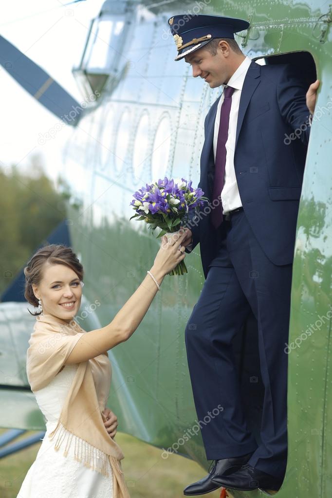 Couple at old airplane