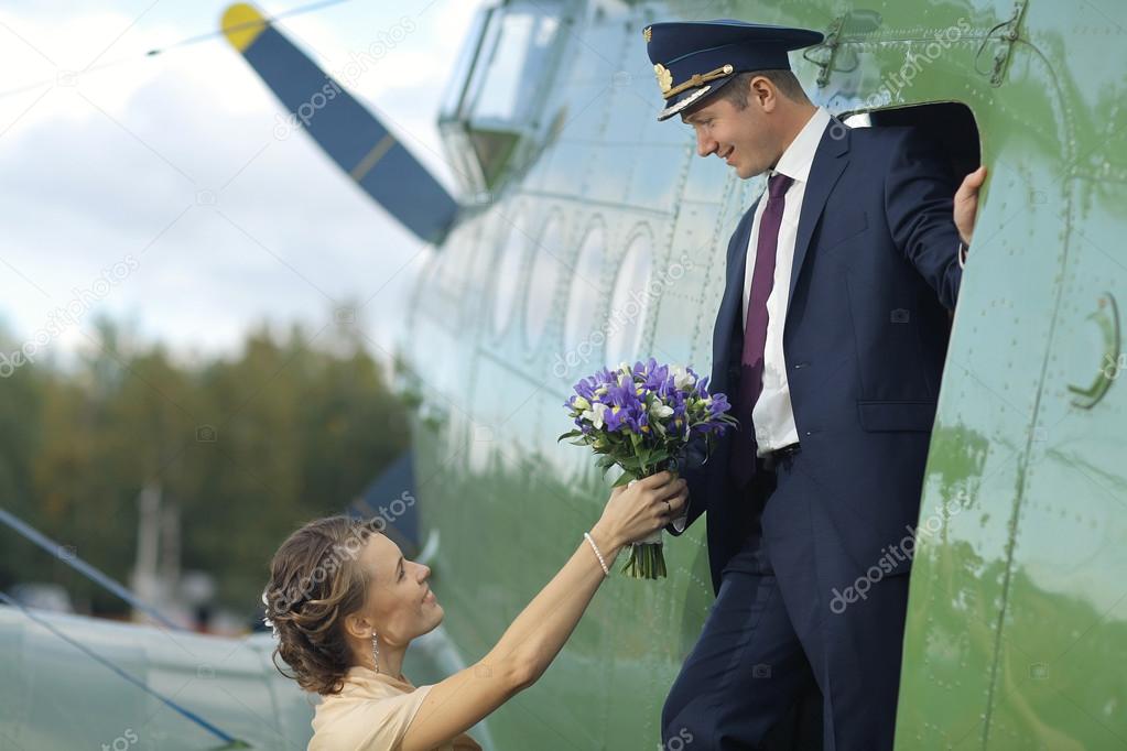 Couple at old airplane