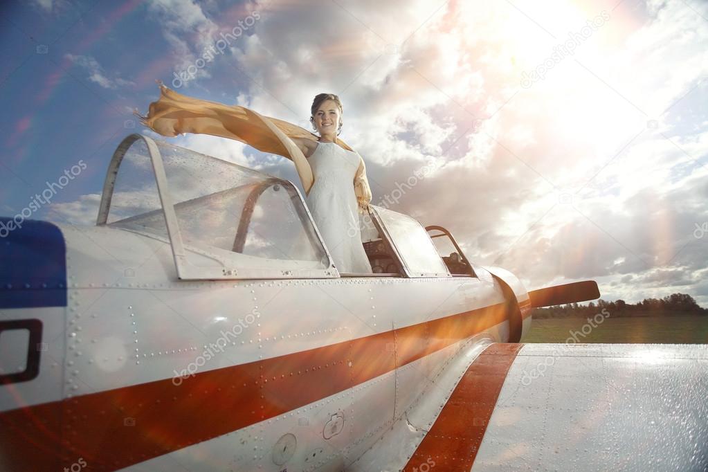 Girl in small plane