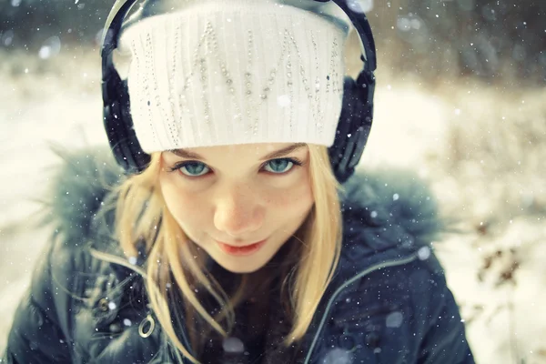 Girl wearing headphones — Stock Photo, Image