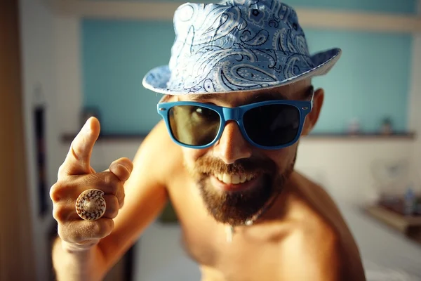 Happy man in hotel on vacation — Stock Photo, Image