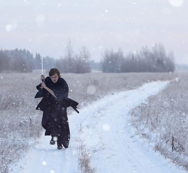 Running samurai in winter field — Stock Photo, Image