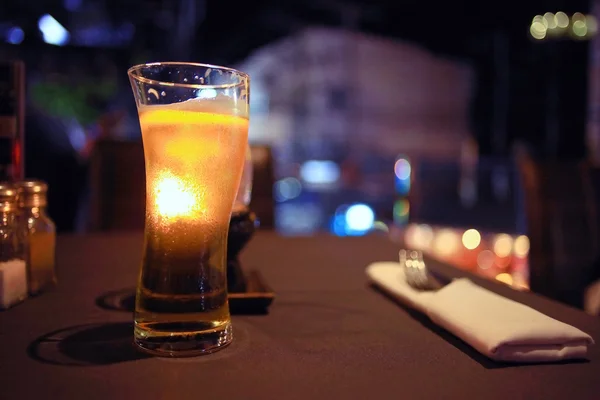 Glass of beer in   restaurant — Stock Photo, Image