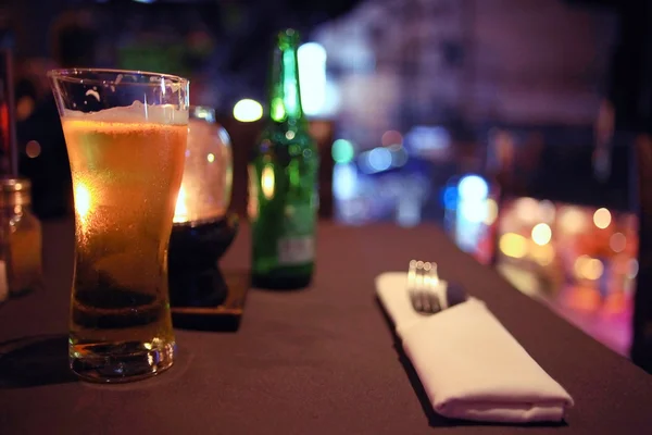 Glass of beer in   restaurant — Stock Photo, Image