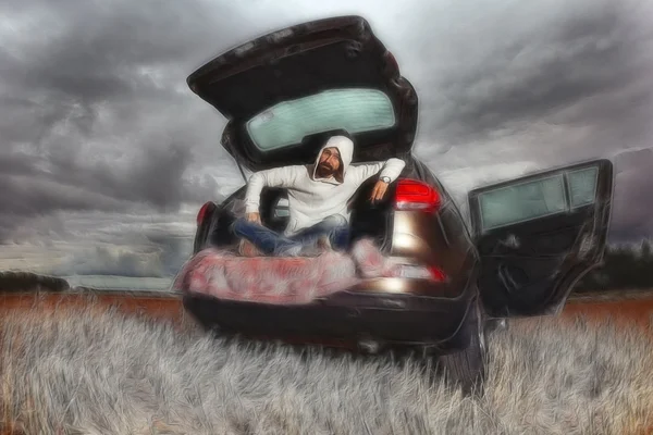 Man traveler in car trunk — Stock Photo, Image