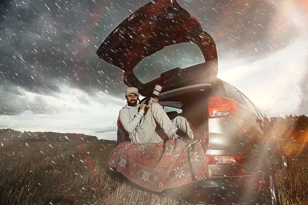 Photographer traveler in car — Stock Photo, Image