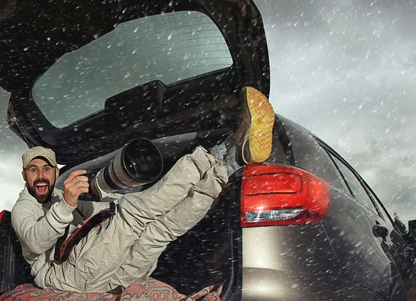 Photographer traveler in car — Stock Photo, Image