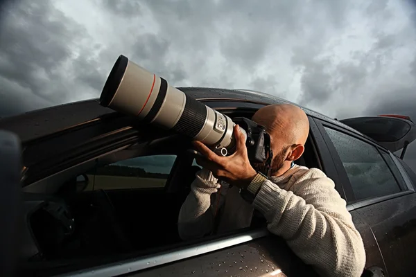 Photographe voyageant en voiture — Photo