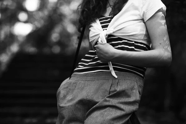 Girl in a striped T-shirt — Stock Photo, Image