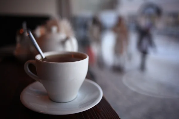 Cup in a cafe near the window Stock Picture