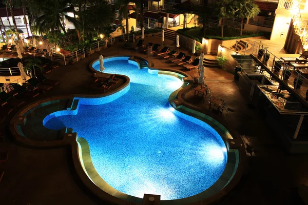 Hotel pool at night — Stock Photo, Image