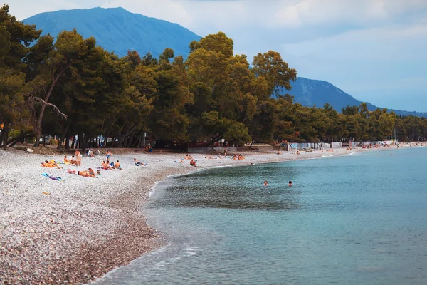 Turystów na plaży — Zdjęcie stockowe