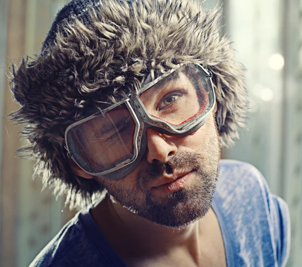 Handsome polar in a fur hat — Stock Photo, Image