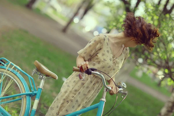 Happy girl on a bicycle — Stock Photo, Image