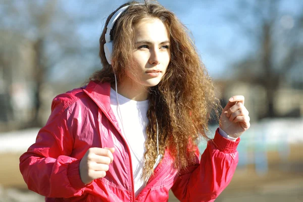 Girl athlete  running outside — Stock Photo, Image