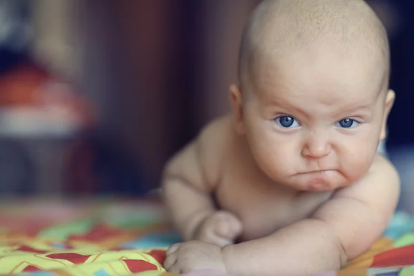 Serious stern baby Stock Photo