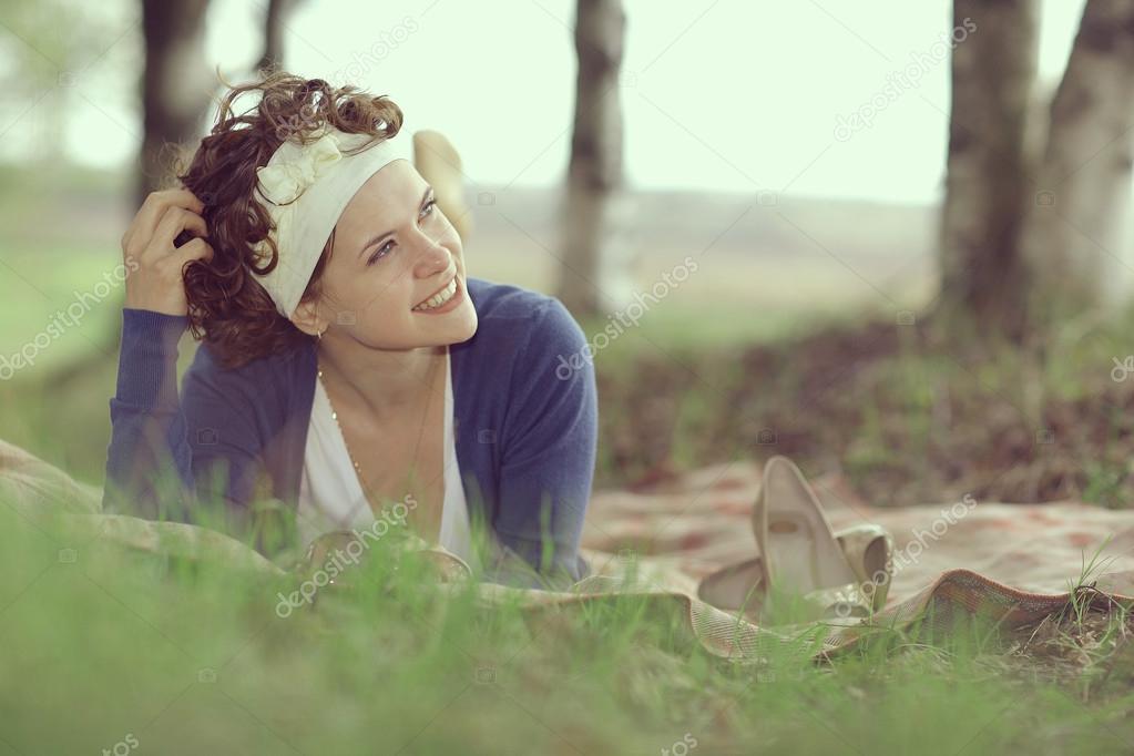 woman lying on the  nature