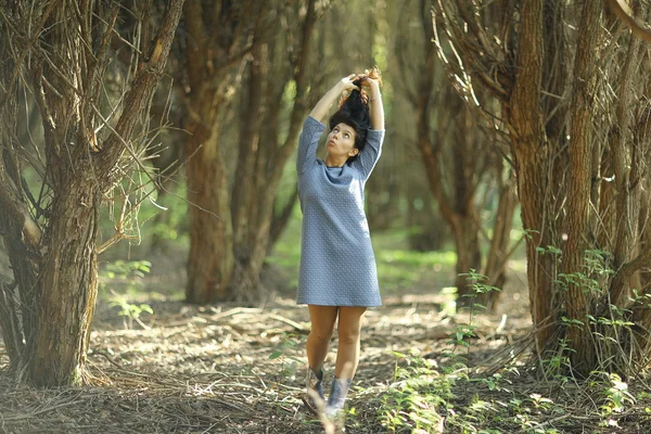 Woman in the summer forest — Stock Photo, Image