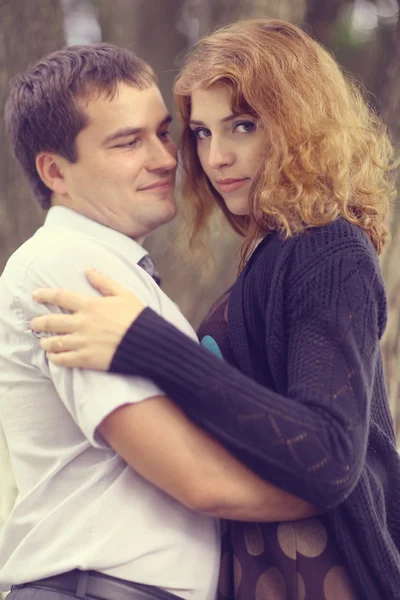 Young couple hugging in the park summer — Stock Photo, Image