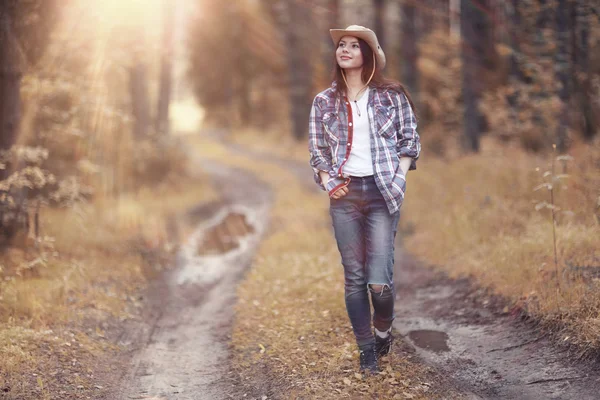 Young girl in the forest ranger — Stock Photo, Image