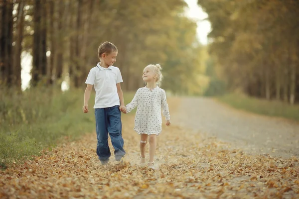 Brother sister nature autumn — Stock Photo, Image