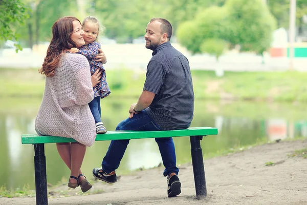 Mom and young daughter and dad — Stock Photo, Image