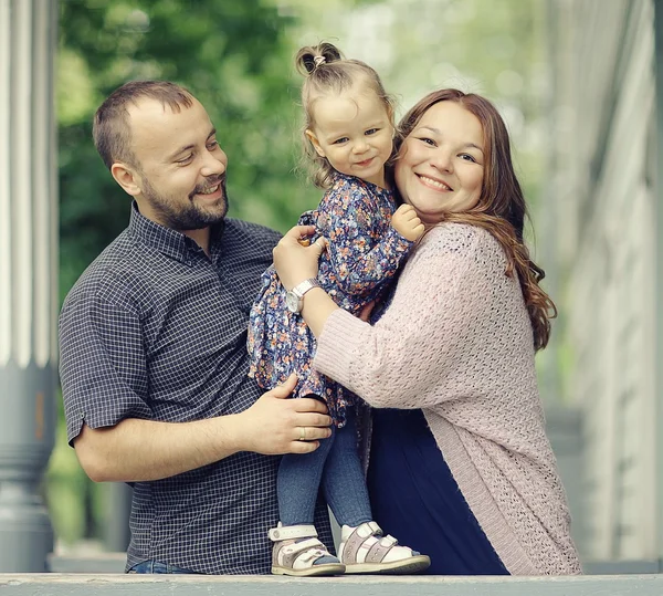 Mom and young daughter and dad — Stock Photo, Image