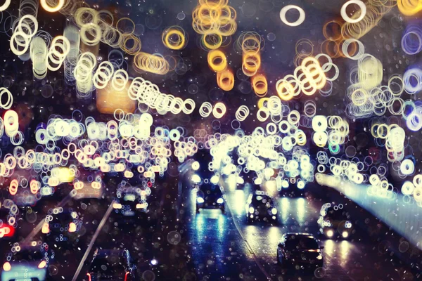 Fundo noite cidade com luzes de movimento — Fotografia de Stock
