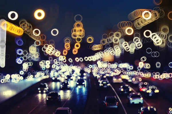 Fondo noche ciudad con luces de movimiento — Foto de Stock