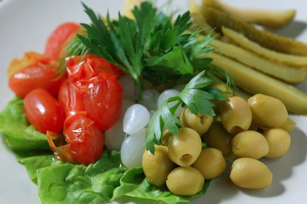 Pickled vegetables on plate — Stock Photo, Image