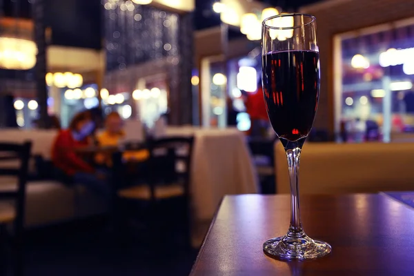 Glass of wine in a restaurant — Stock Photo, Image