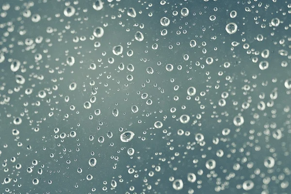 Gotas de lluvia sobre el vidrio —  Fotos de Stock