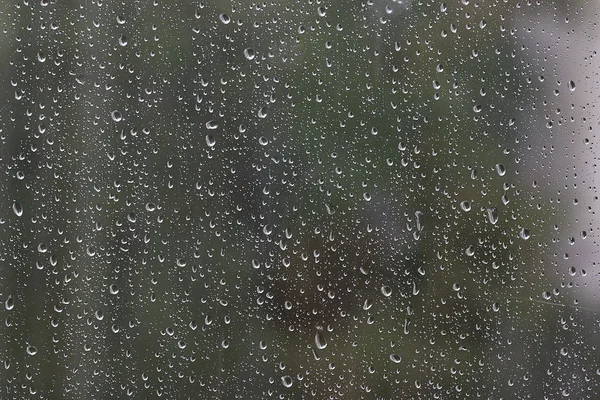 Gotas de chuva no vidro — Fotografia de Stock