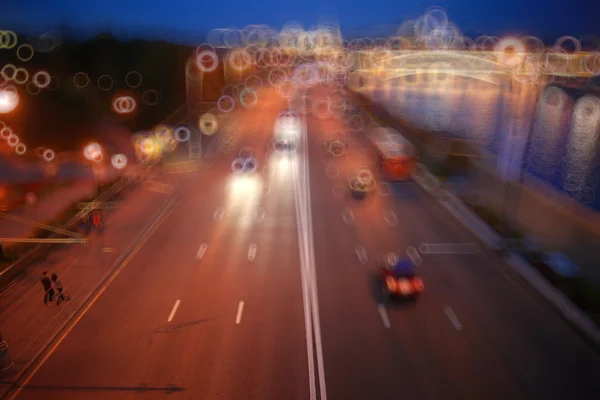 Fondo difuminado noche ciudad tráfico — Foto de Stock