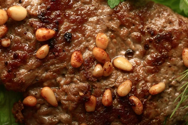 Steak grill with nuts — Stock Photo, Image