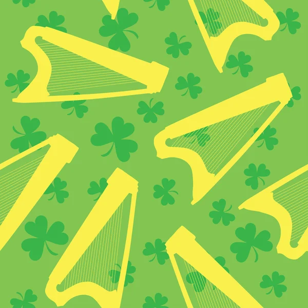 Patrón sin costuras con arpa celta y trébol sobre fondo verde — Vector de stock