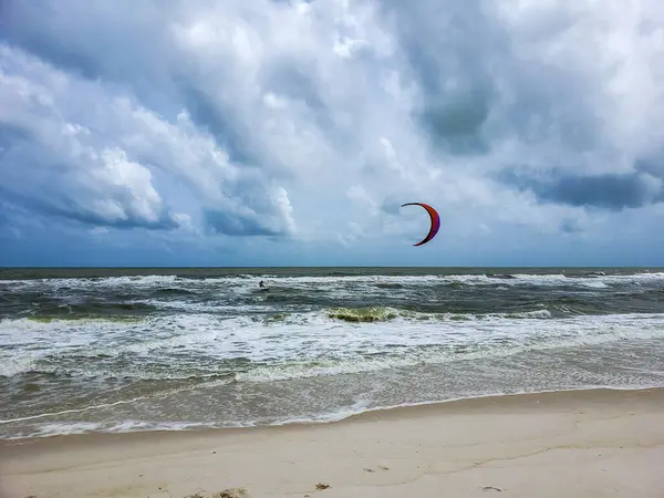 Kite surfing in the gulf at Perdido Key beach, Florida