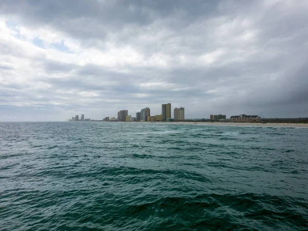 The beach in Gulf Shores, Alabama at the Gulf State pier in April of 2021